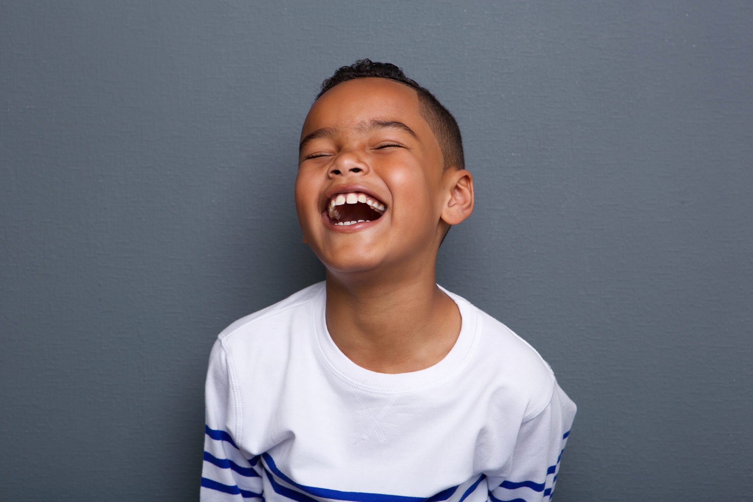 Young boy laughing