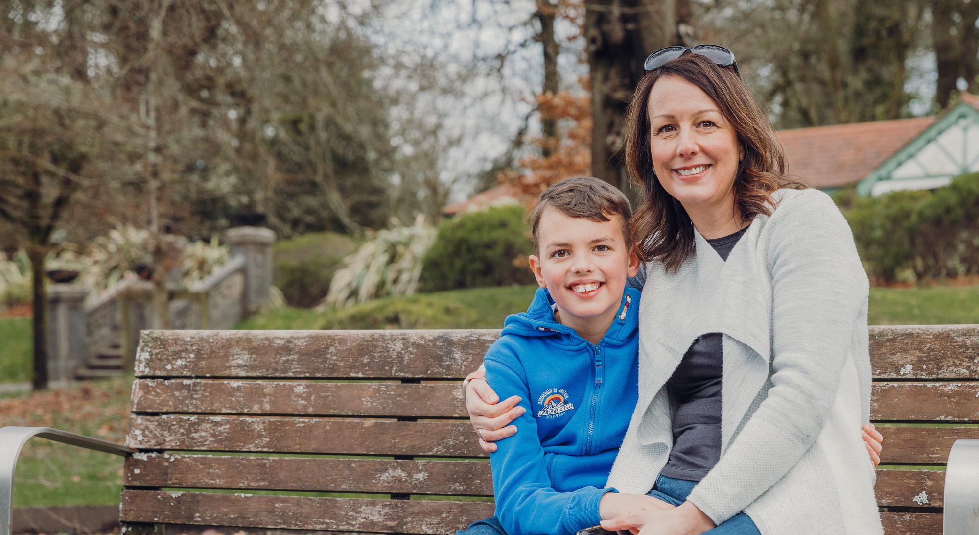 A woman and a boy on the bench